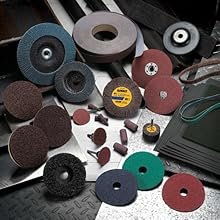Different sanding discs and sanding belts